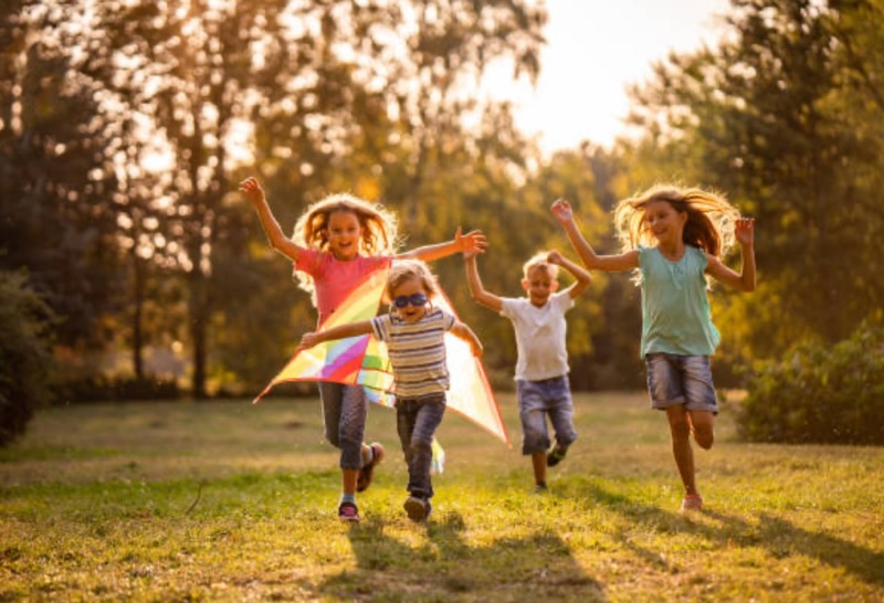 Happy Kids Running outside